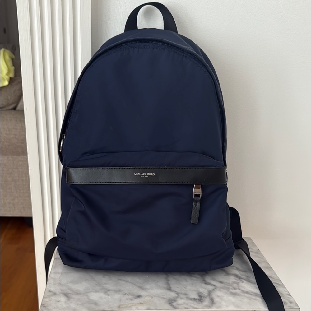 Michael Kors Blue Minimalist Backpack with Structured Design
